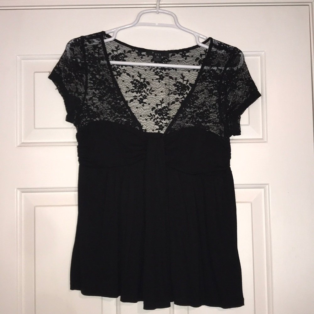 Black lacy going out top. Size M. Forever 21.